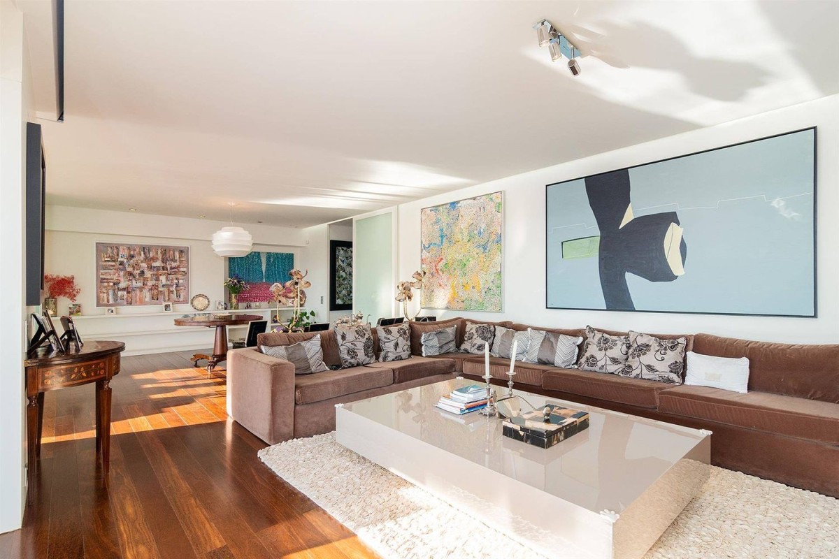 The property is characterised by large, bright living spaces