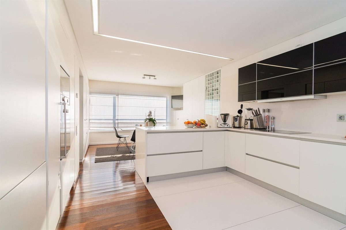 The kitchen is modern and open